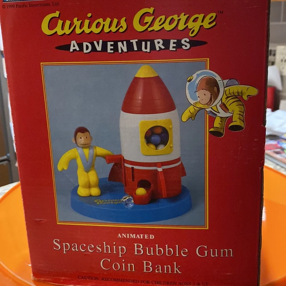 Vintage Curious George Adventure Animated space ship gum ball coin bank.